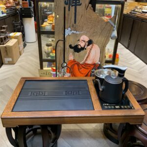 BÀN TRÀ ĐIỆN PHÒNG KHÁCH GỖ CÁNH GÀ MẶT ĐÁ